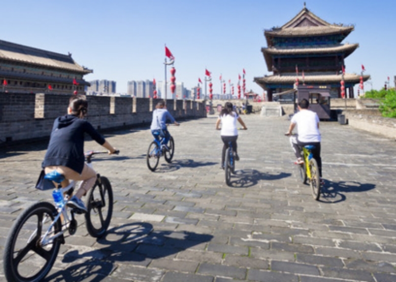 cycle on the city wall